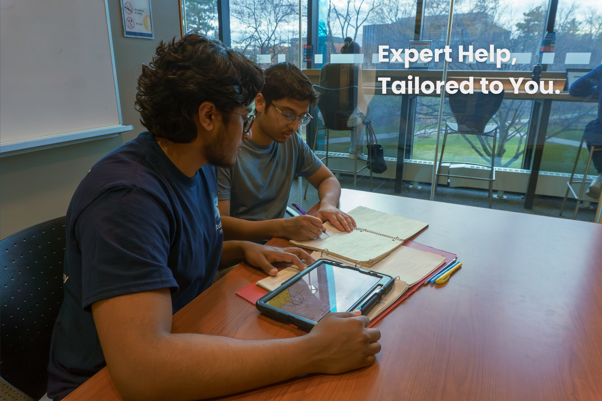 Tutor working with a student